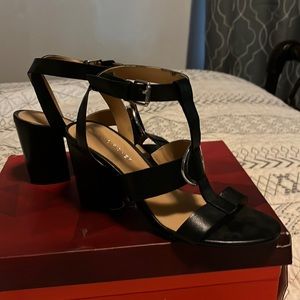 Black 3 inch sandal. Only worn once